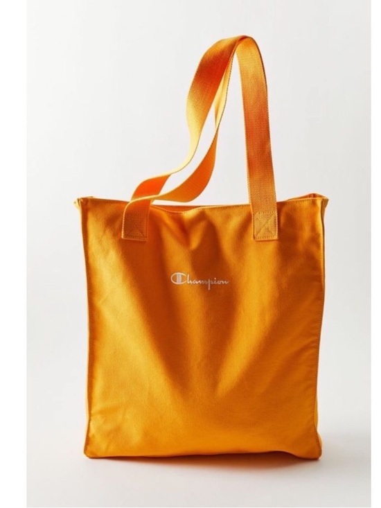 Champion Handbags - Champion Urban Outfitters 
Exclusive Canvas Zip Tote Bag Yellow book bag school